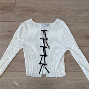 Elegant Cream Ribbed Top with Black Bow Accents | Kimchi Blue